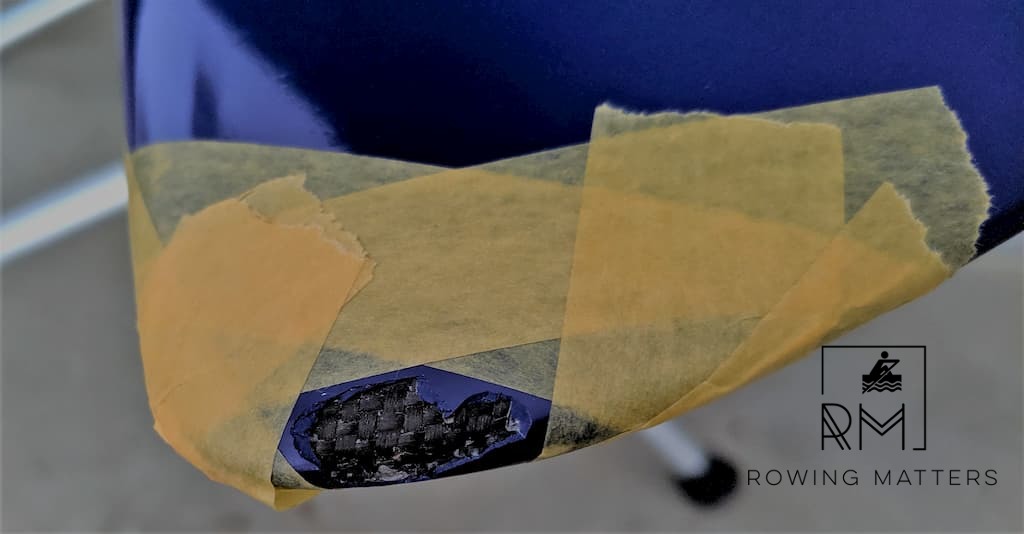 Die abgeklebte zu reparierende Stelle